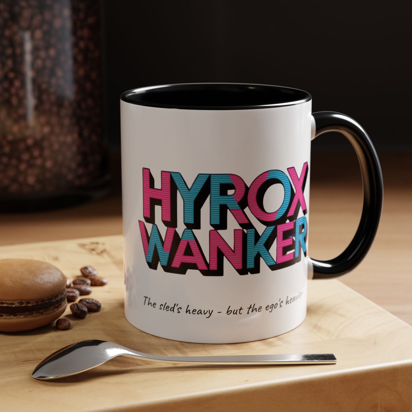 "White / black ceramic mug with humorous HYROX training text about heavy sleds and egos"