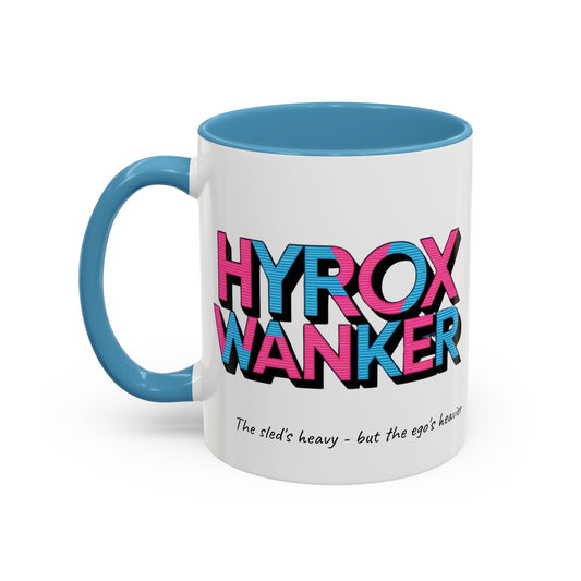 "White / blue ceramic mug with humorous HYROX training text about heavy sleds and egos"